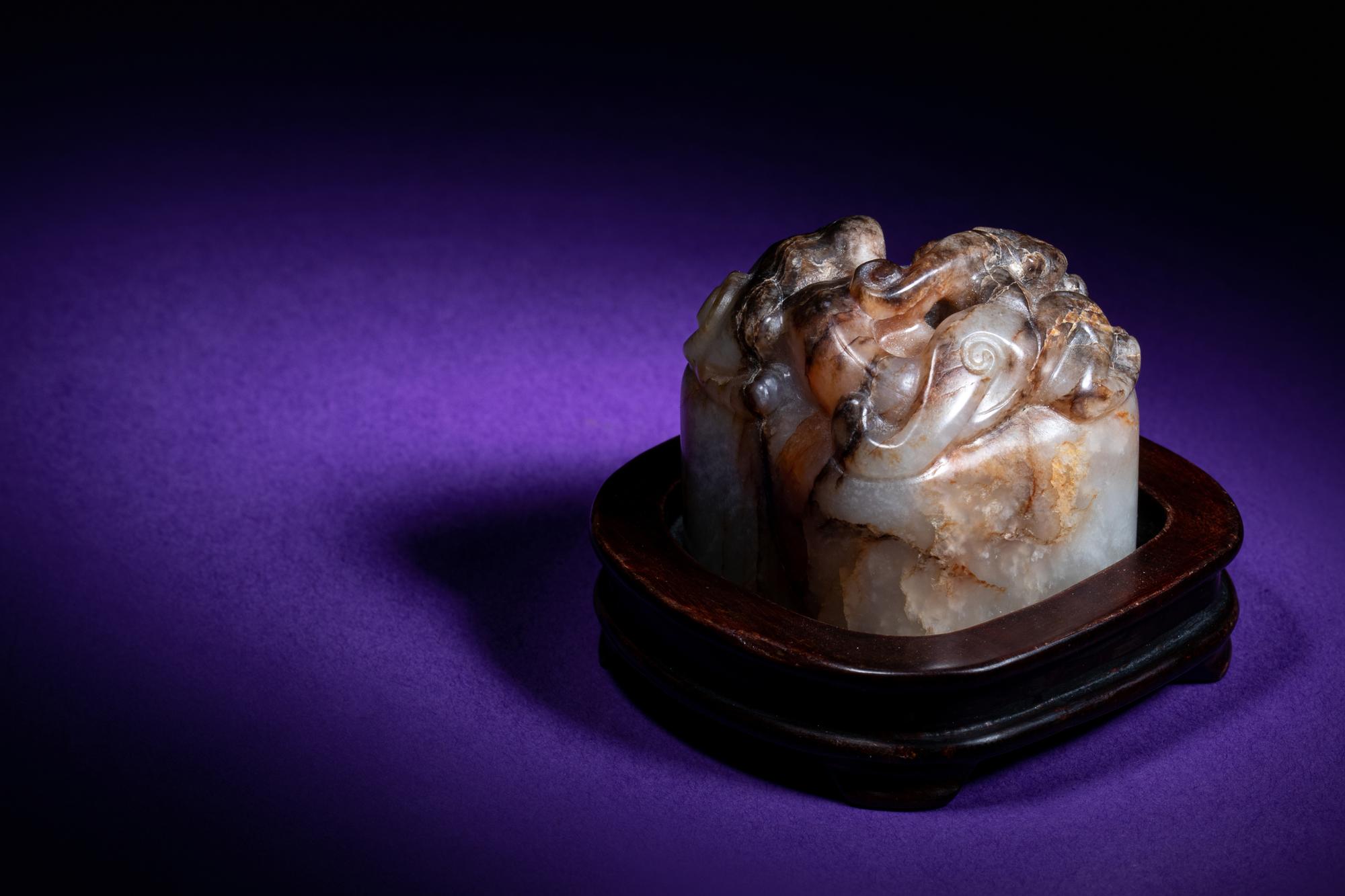 A Chinese White and Russet Jade Seal
