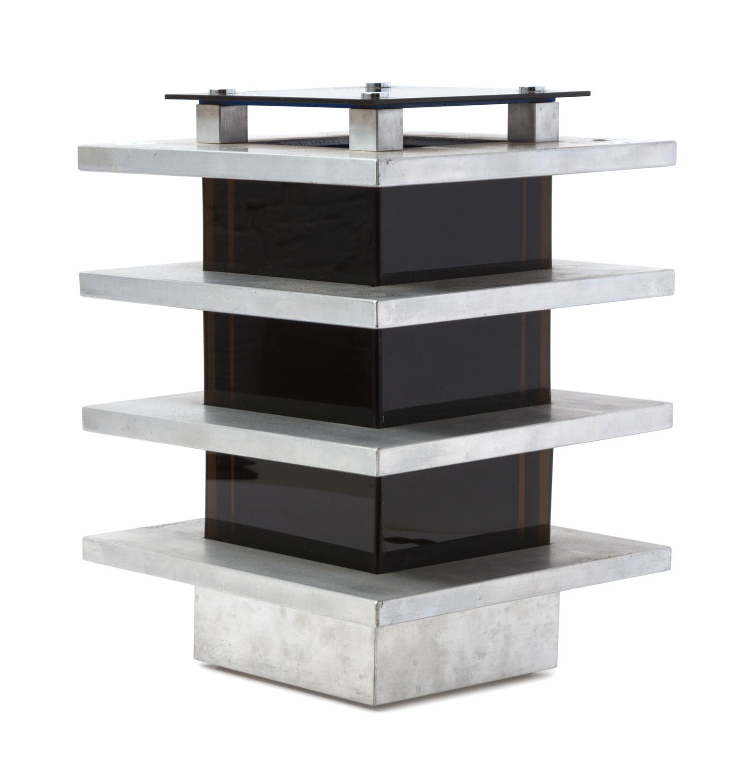 A Modernist Aluminum and Lucite Table Lamp Height overall 13 1/2 inches. — CIRCA 1970