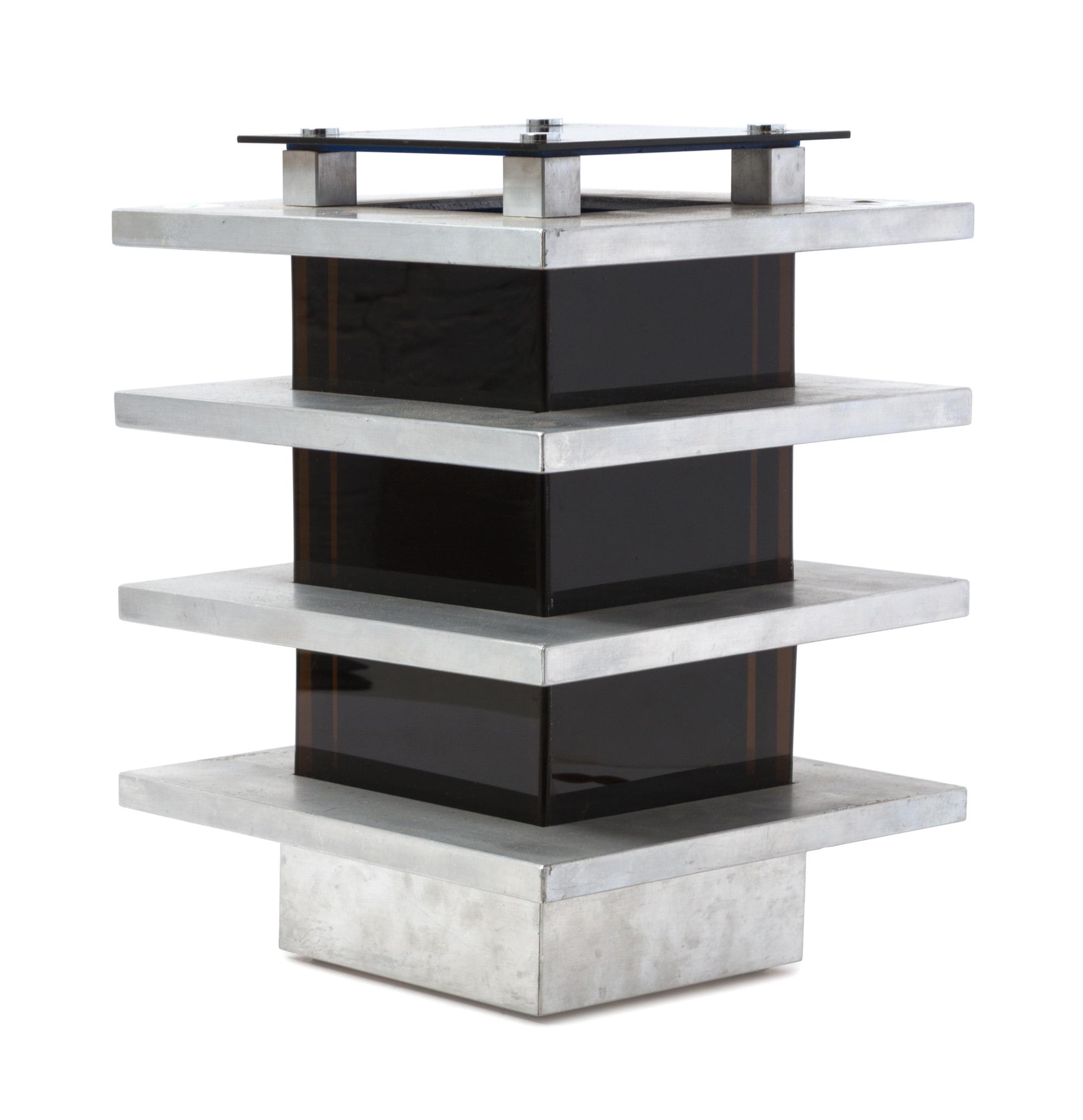A Modernist Aluminum and Lucite Table Lamp Height overall 13 1/2 inches. — CIRCA 1970