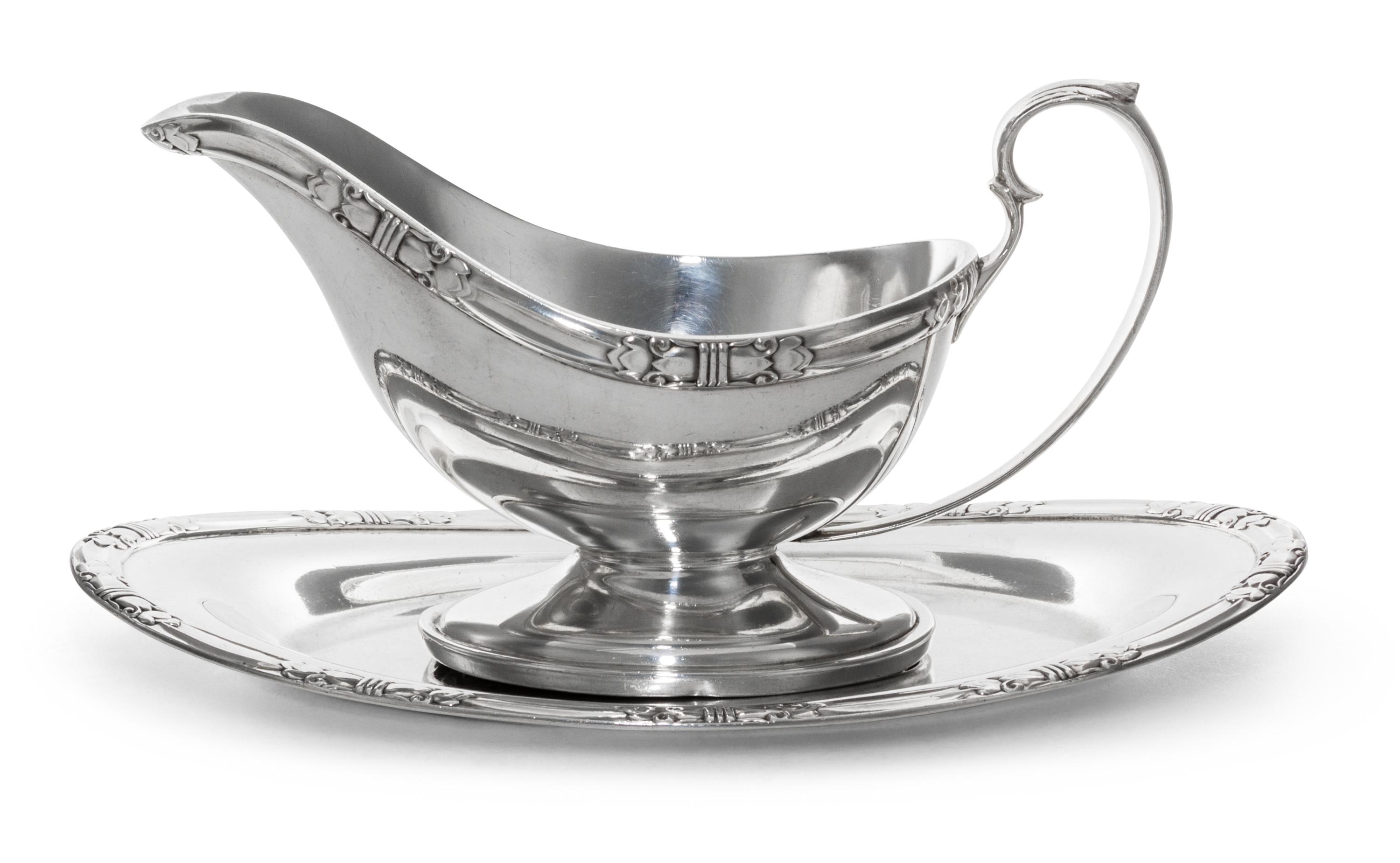 An American Silver Sauce Boat and Underplate, Manchester Silver Co., Providence, RI, 20th Century, of oval form with a banded edge.