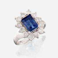 A sapphire, diamond, and white gold ring