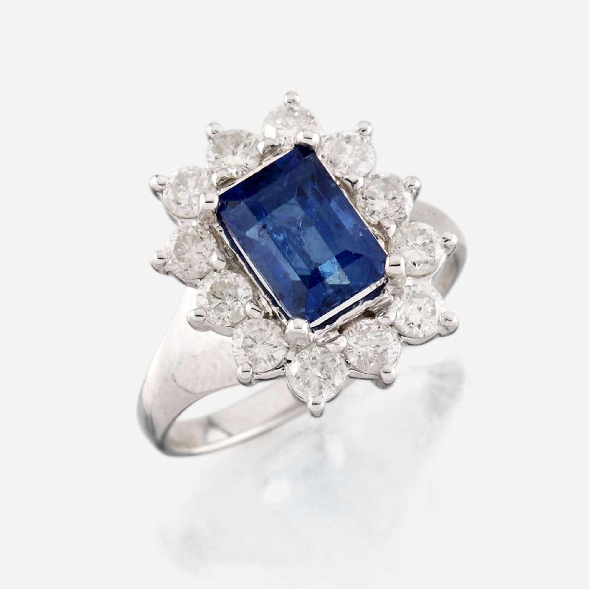 A sapphire, diamond, and white gold ring