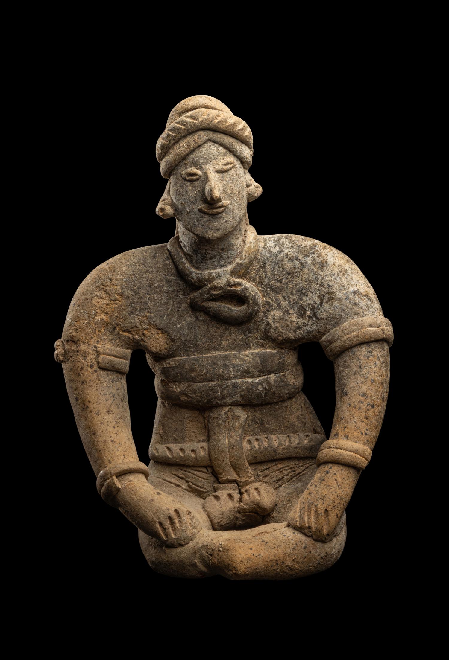 A Colima Seated Figure