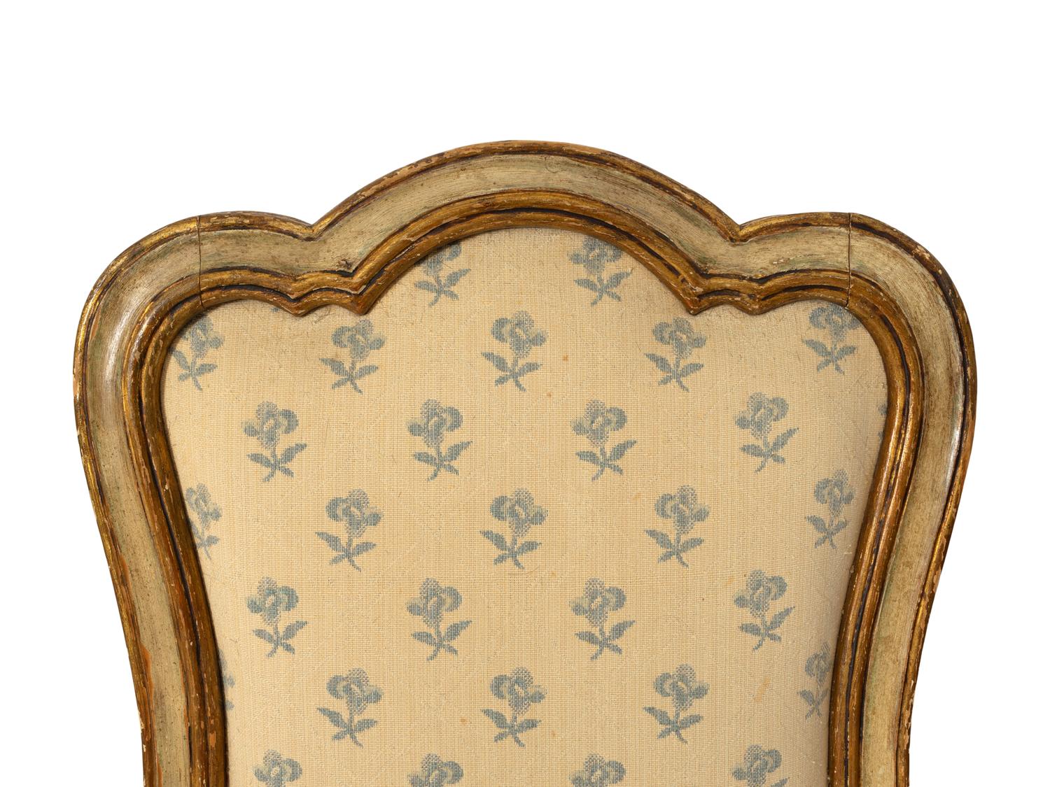 A Set of Four Venetian Rococo Cream-Painted and Parcel Gilt Dining Chairs