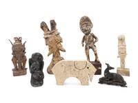A Collection of Seven Figural Articles