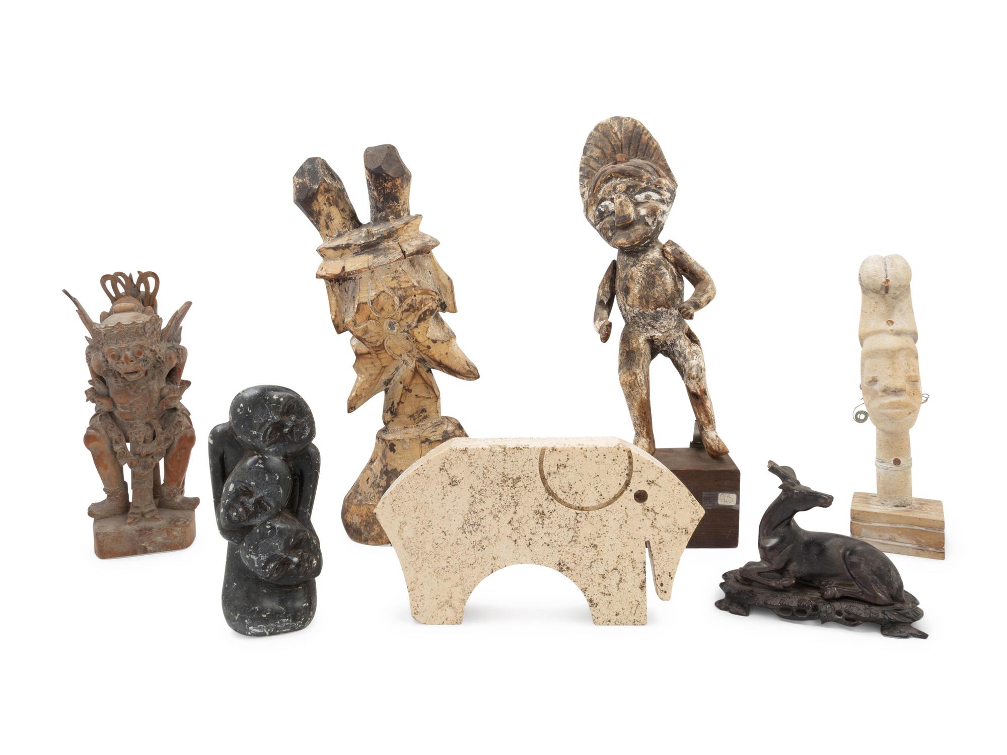 A Collection of Seven Figural Articles