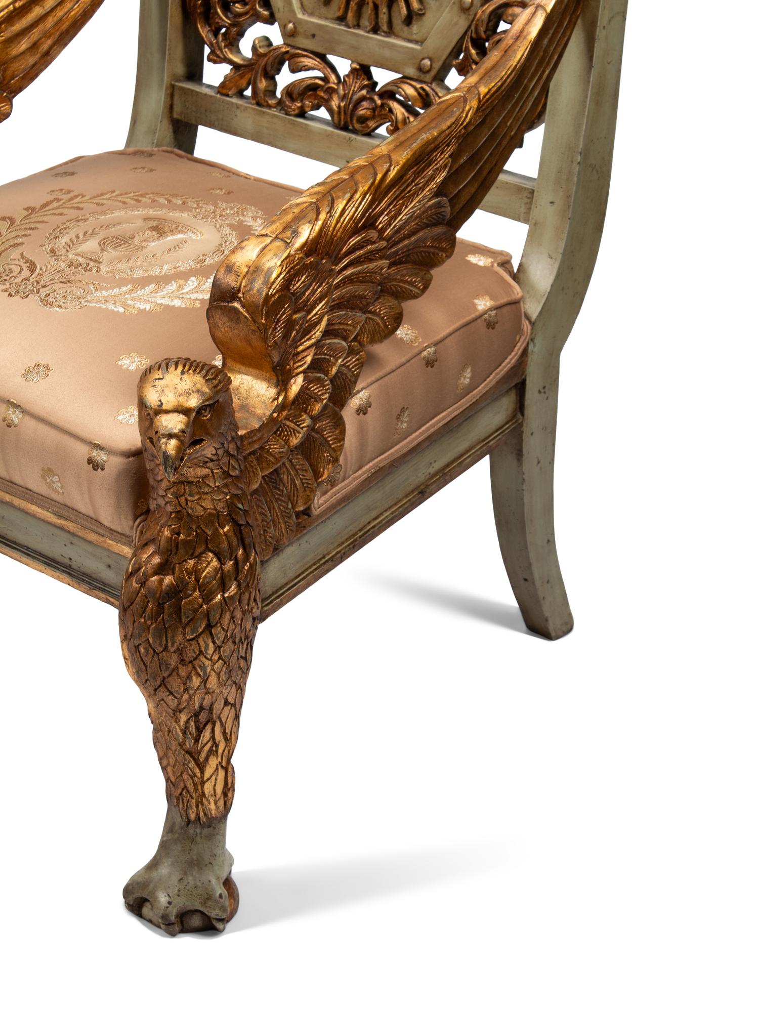 A Pair of Italian Neoclassical Style Painted and Parcel Gilt Eagle-Motif Armchairs