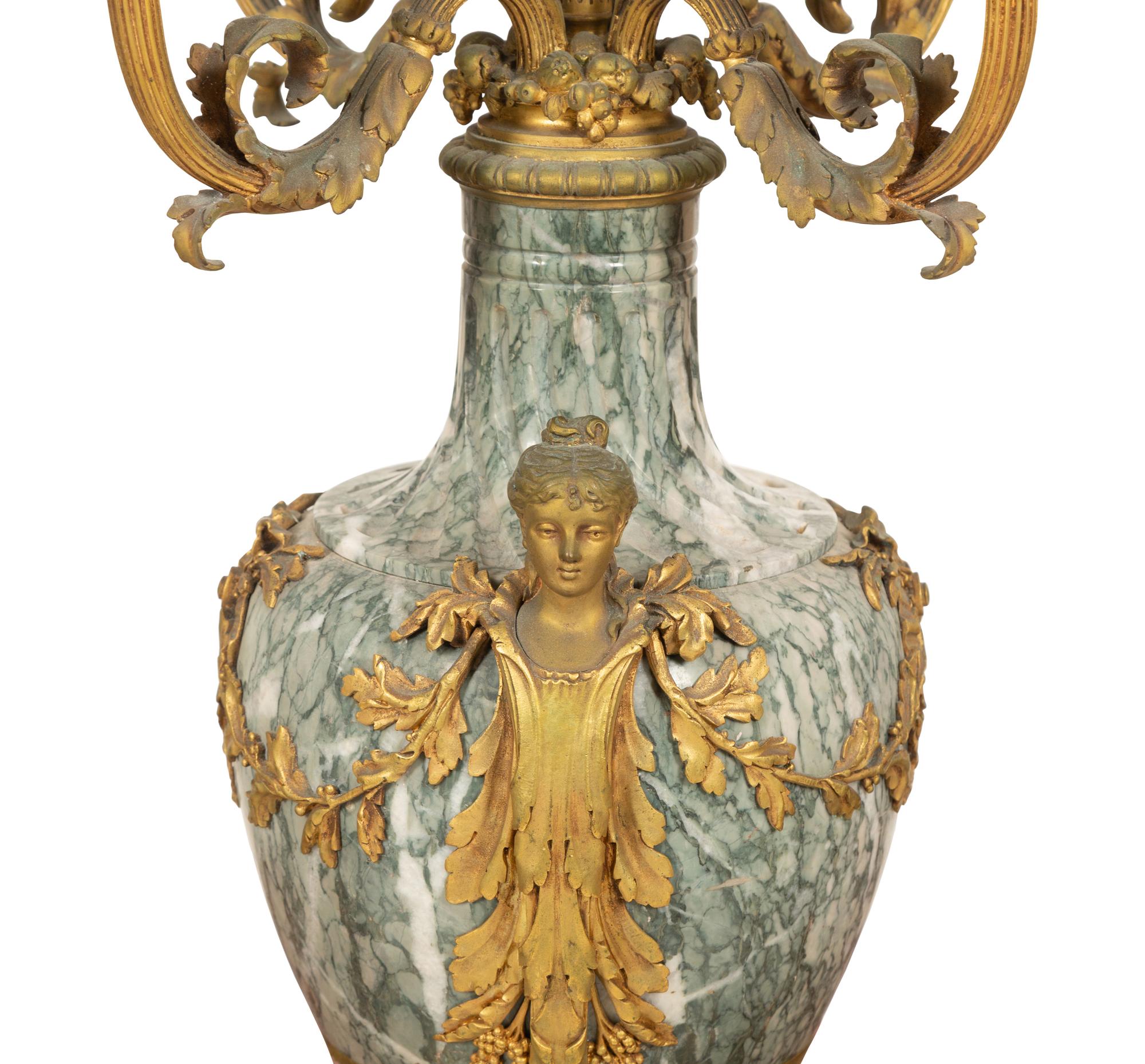 A Pair of Louis XV Style Gilt Bronze and Marble Five-Light Candelabra