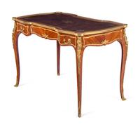 A Louis XV Style Gilt Bronze Mounted Kingwood Bureau Plat by François Linke