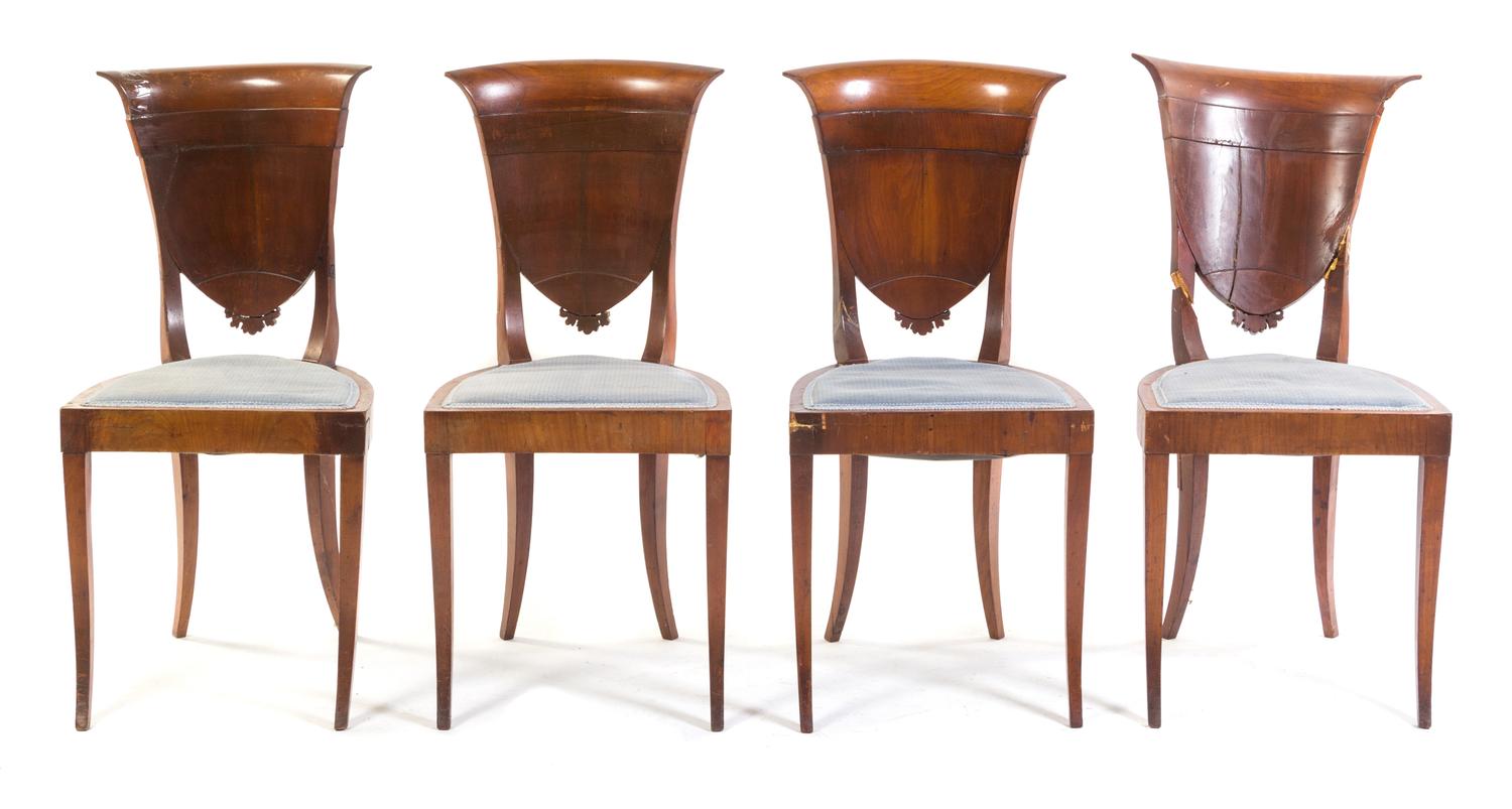 A Set of Four French Walnut Side Chairs Height 35 1/2 inches.