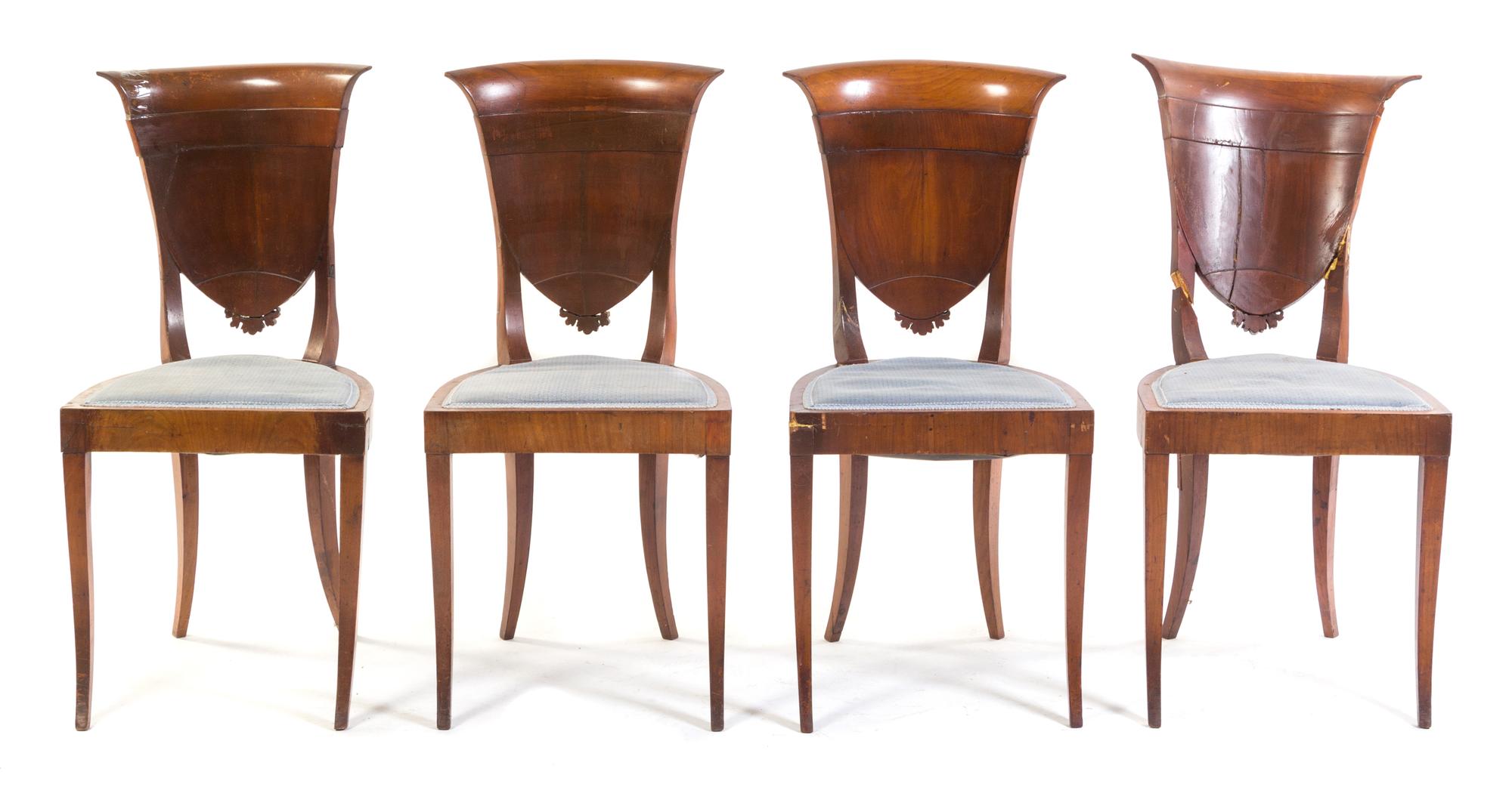 A Set of Four French Walnut Side Chairs Height 35 1/2 inches.