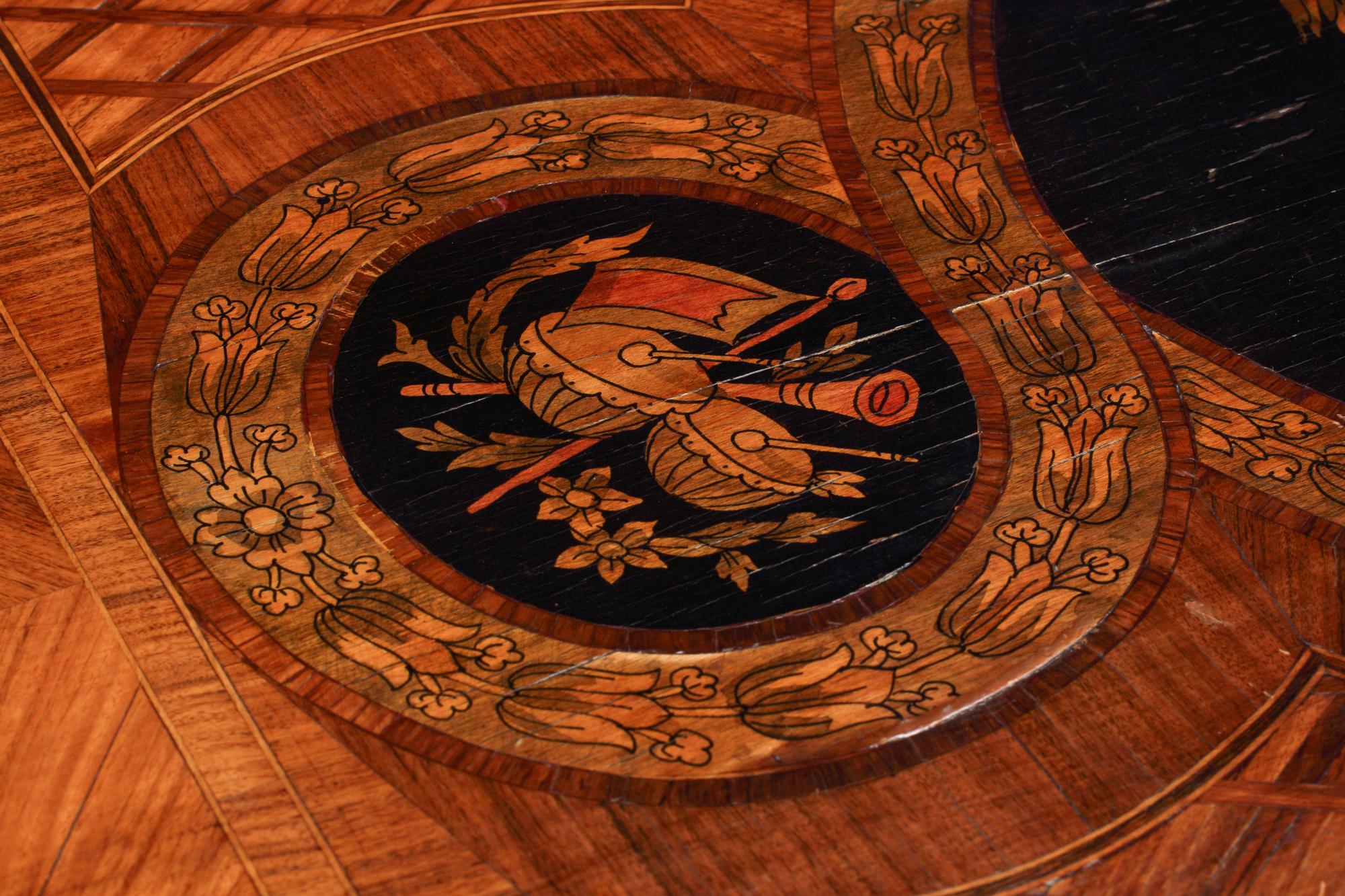 A Louis XVI Style Marquetry Center Table