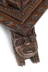 An Italian Renaissance Revival Carved Walnut Chest of Drawers