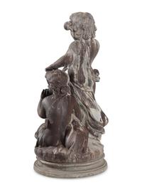A Cast Lead Figural Group