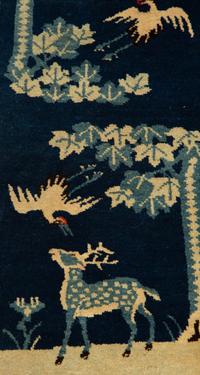 A Group of Three Chinese Rugs