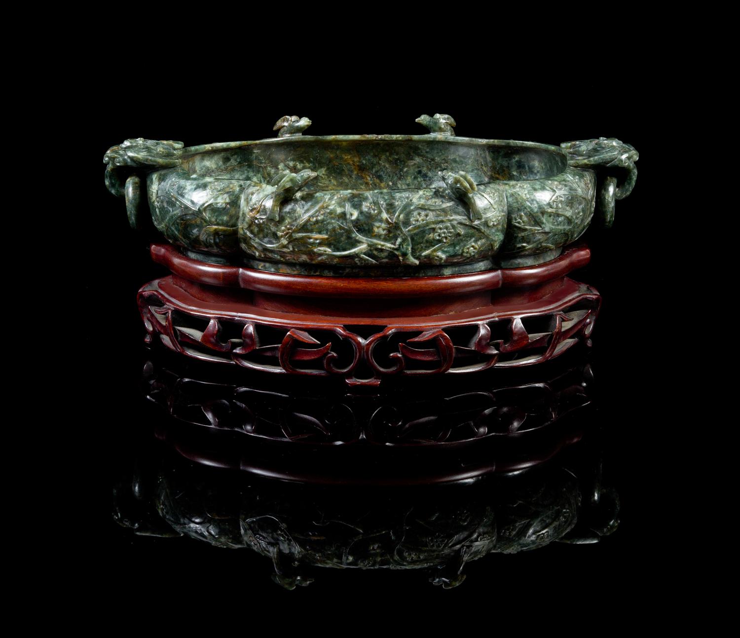 A Large Chinese Spinach Jade Marriage Bowl EARLY 20TH CENTURY Length 13 1/4 inches. — EARLY 20TH CENTURY