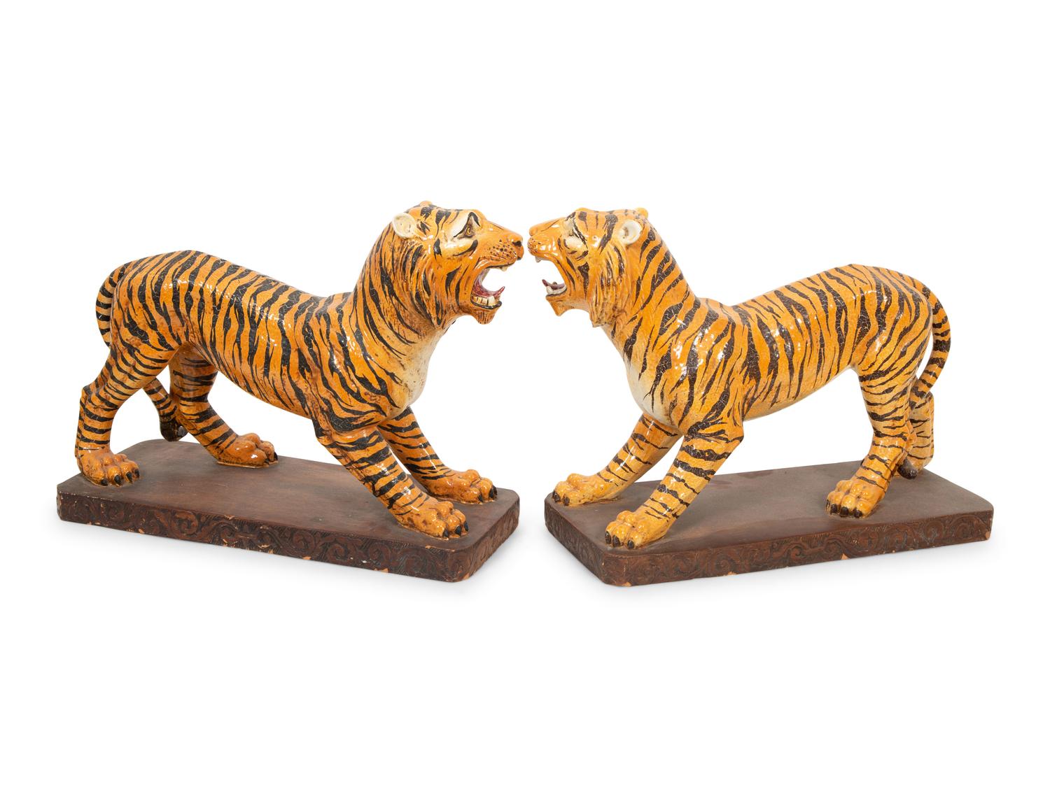 A Pair of Italian Glazed Terracotta Figures of Standing Tigers