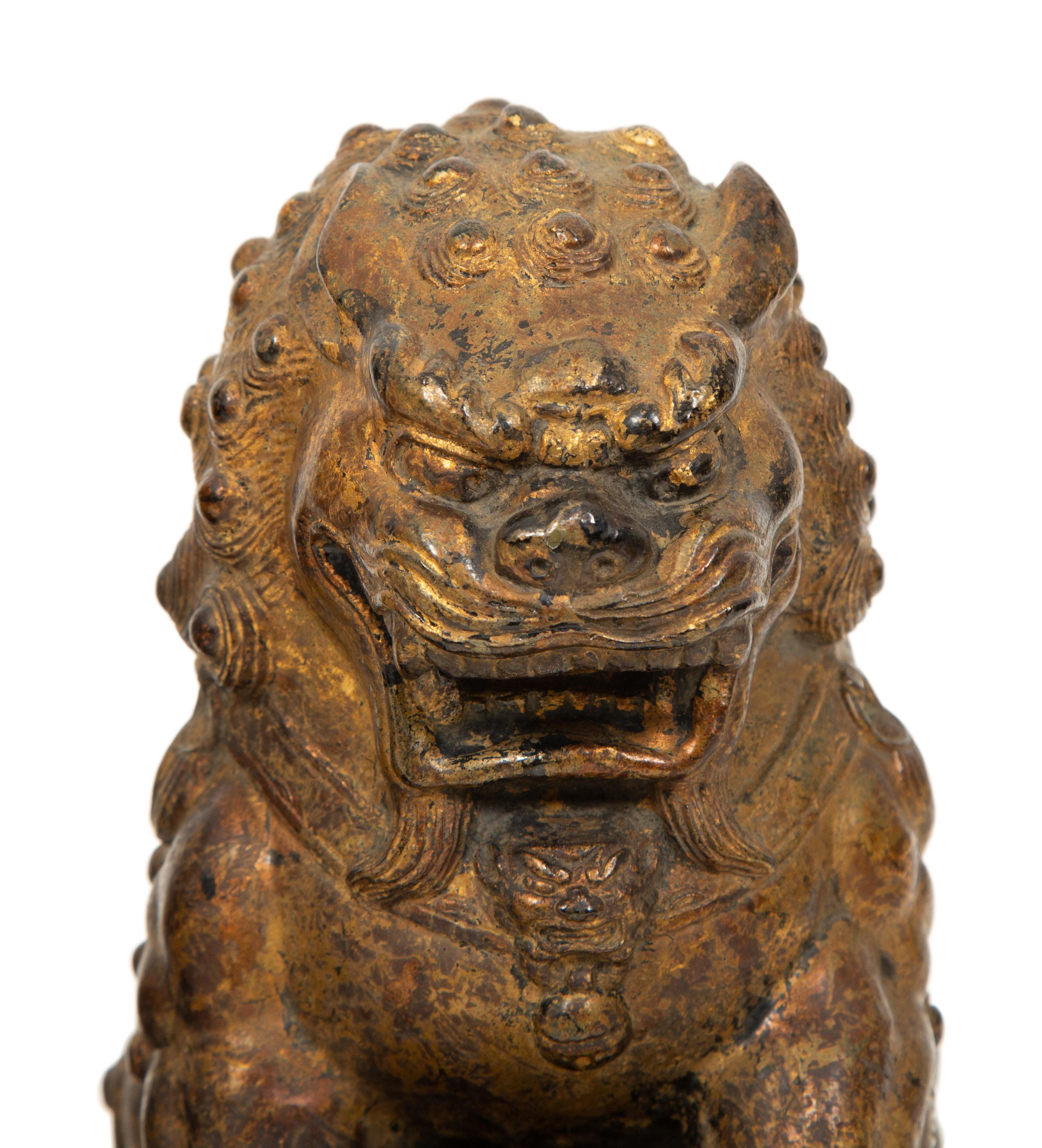 A Pair of Gilt Bronze Fu Lions