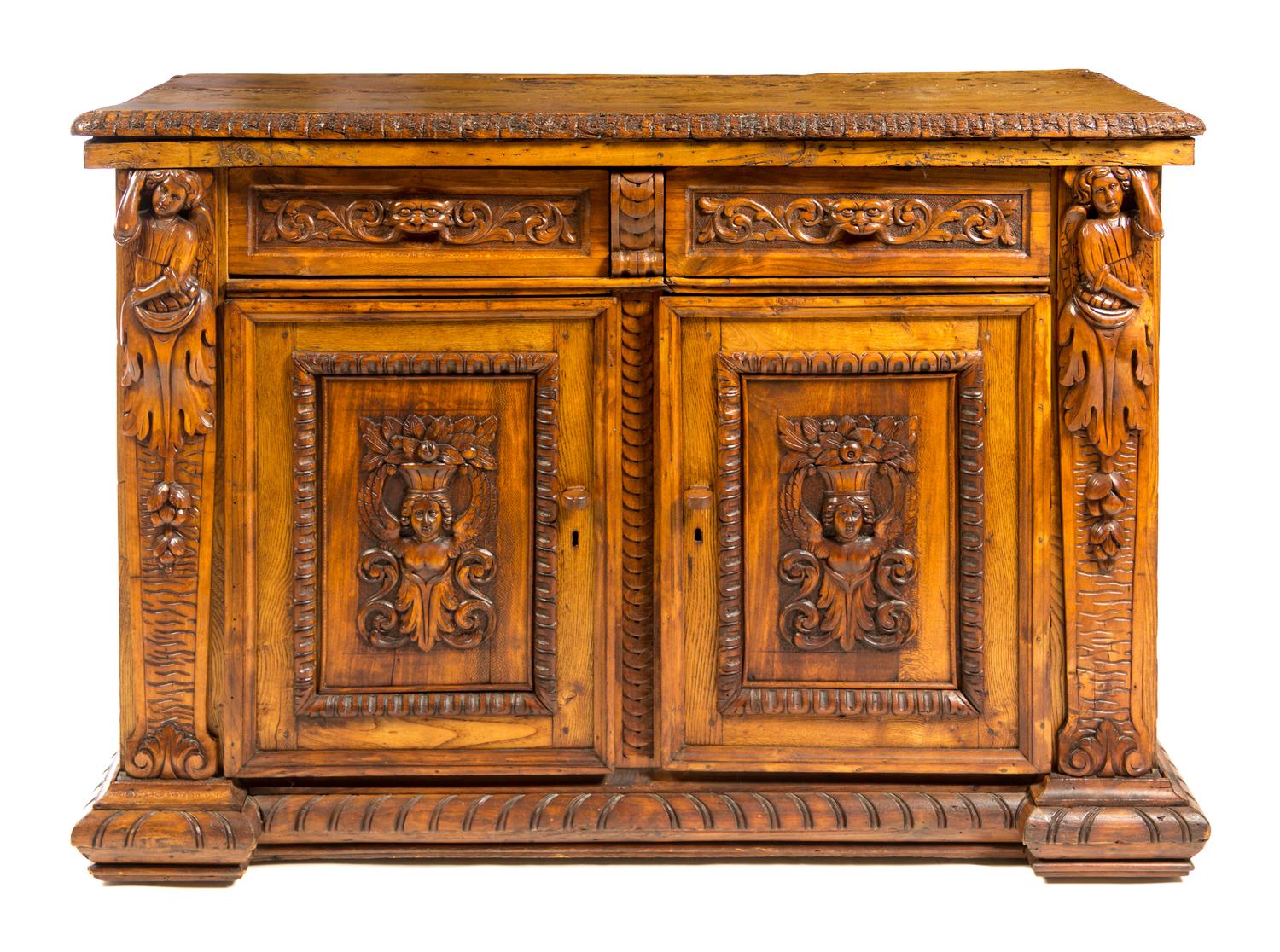 An Italian Renaissance Style Walnut Cabinet Height 38 1/2 x width 55 1/2 x depth 22 5/8 inches. — INCORPORATING 16TH CENTURY ELEMENTS