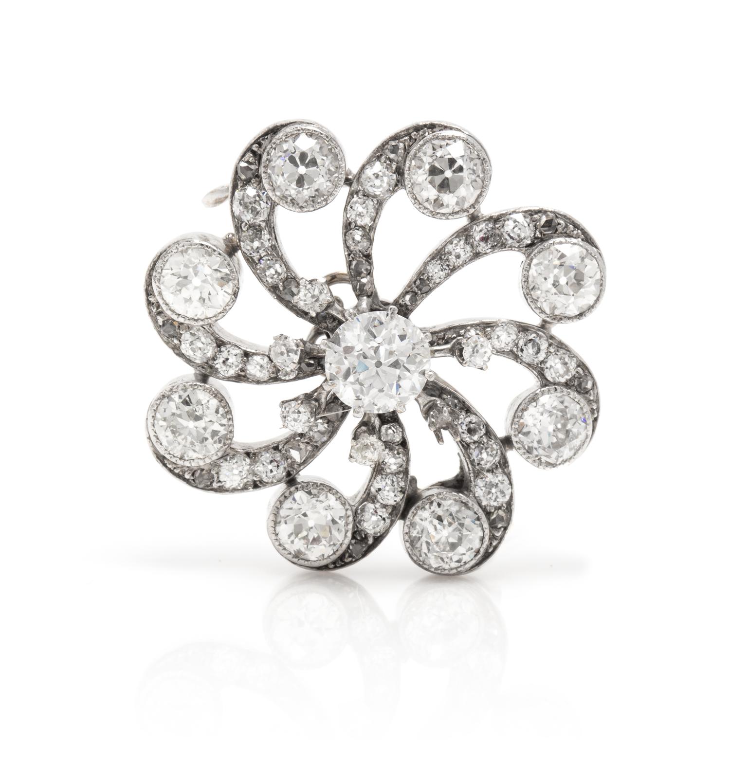 An Antique White Gold and Diamond Starburst Brooch, 7.20 dwts.