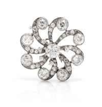 An Antique White Gold and Diamond Starburst Brooch, 7.20 dwts.