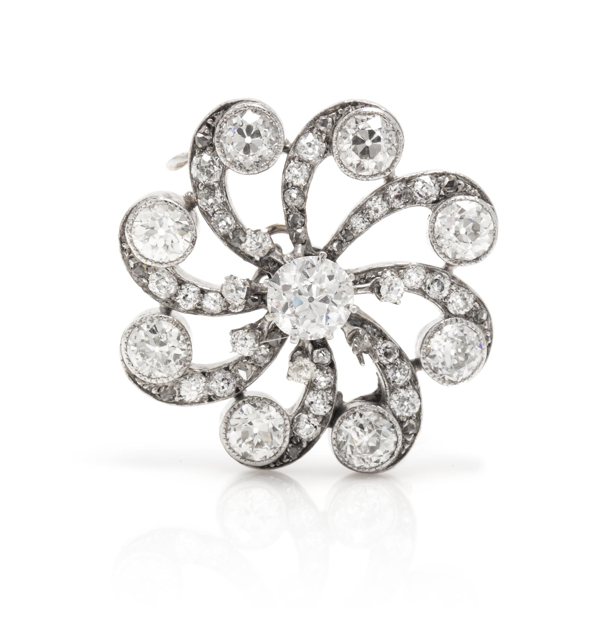 An Antique White Gold and Diamond Starburst Brooch, 7.20 dwts.