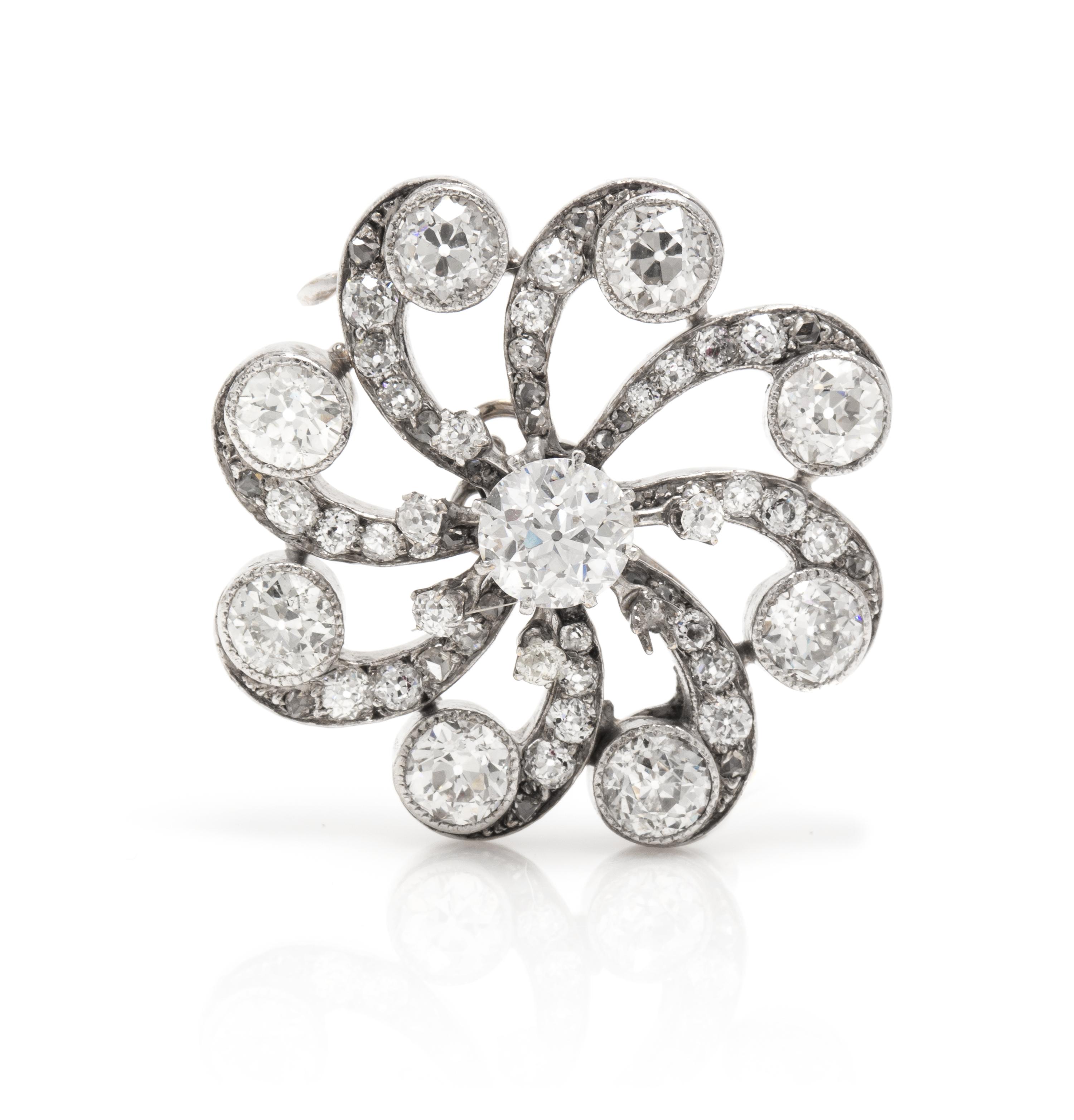 An Antique White Gold and Diamond Starburst Brooch, 7.20 dwts.