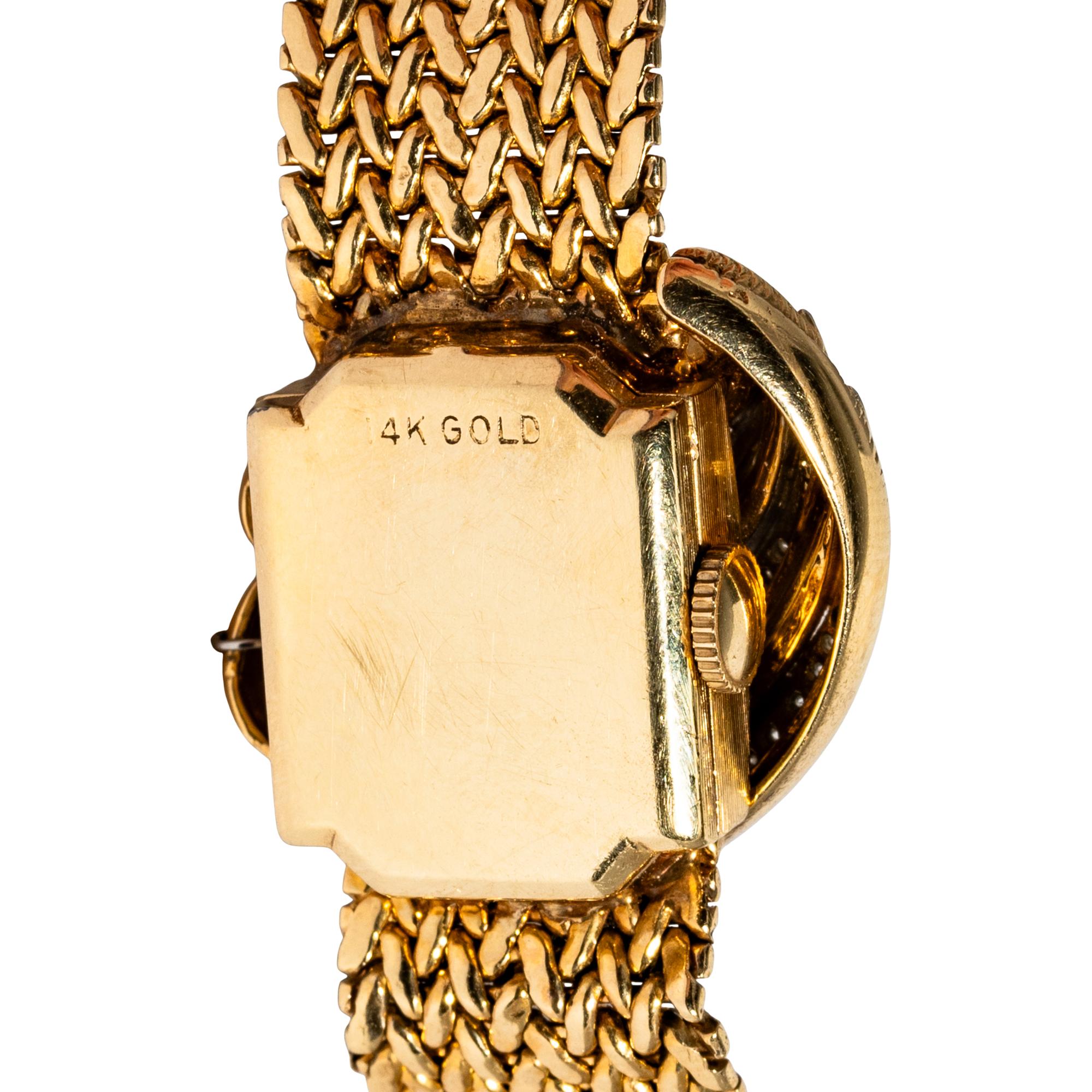 HEIRLOOM, RETRO, YELLOW GOLD AND DIAMOND SURPRISE WATCH