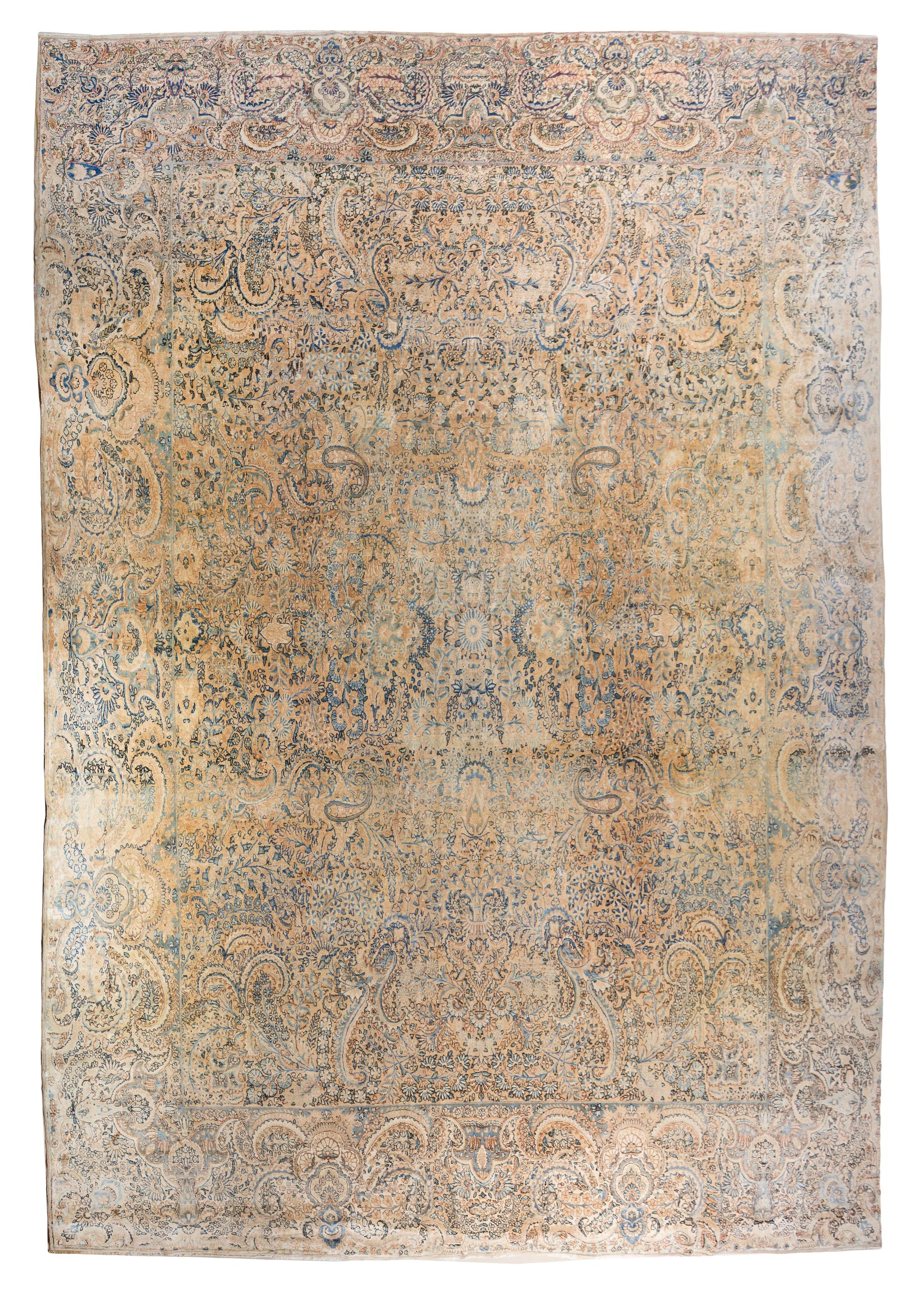 A Kirman Wool Carpet 15 feet 7 inches x 14 feet.
