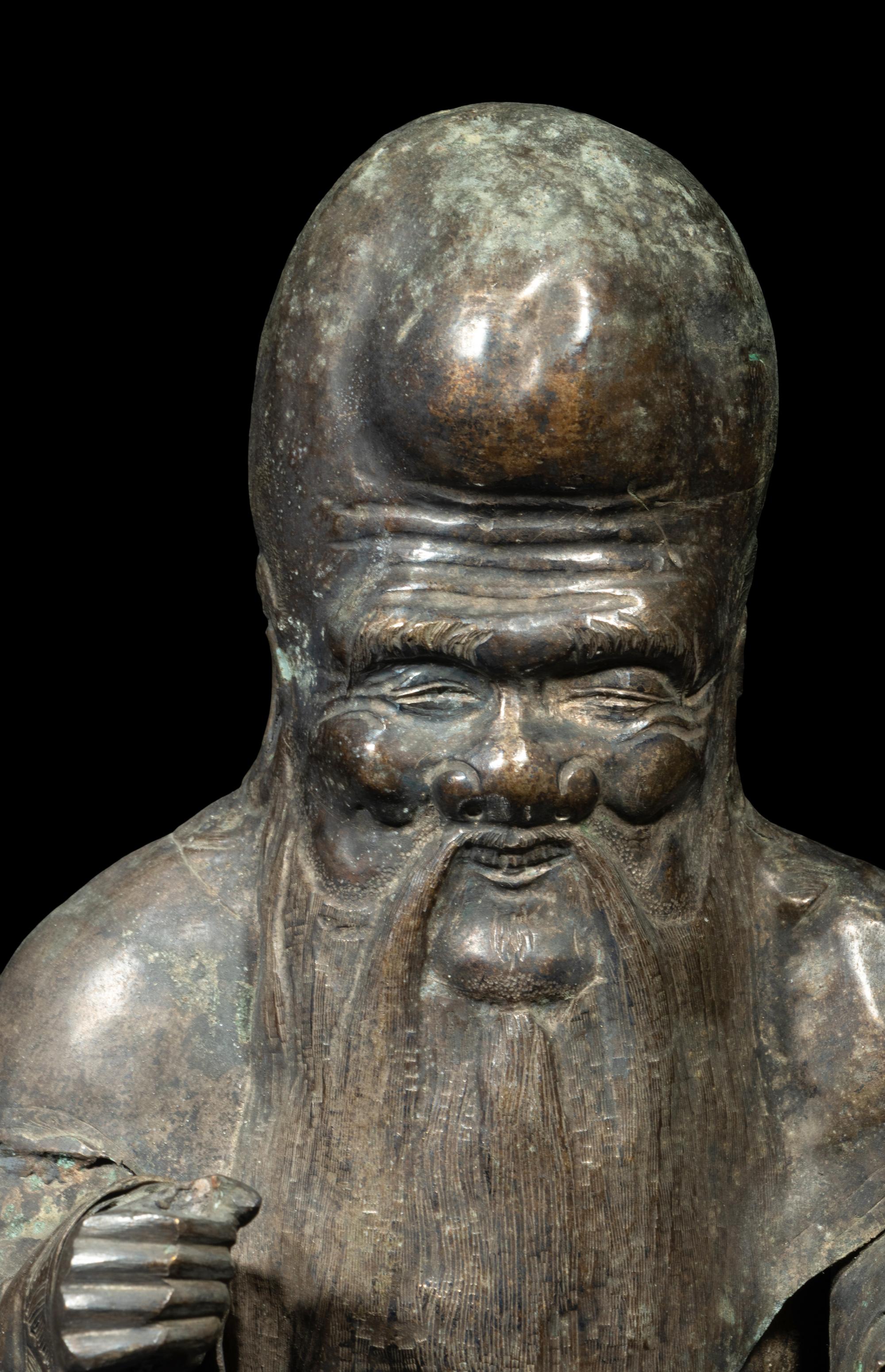 A Chinese Silver Figure of Shoulao and A Chinese Bronze Incense Burner
