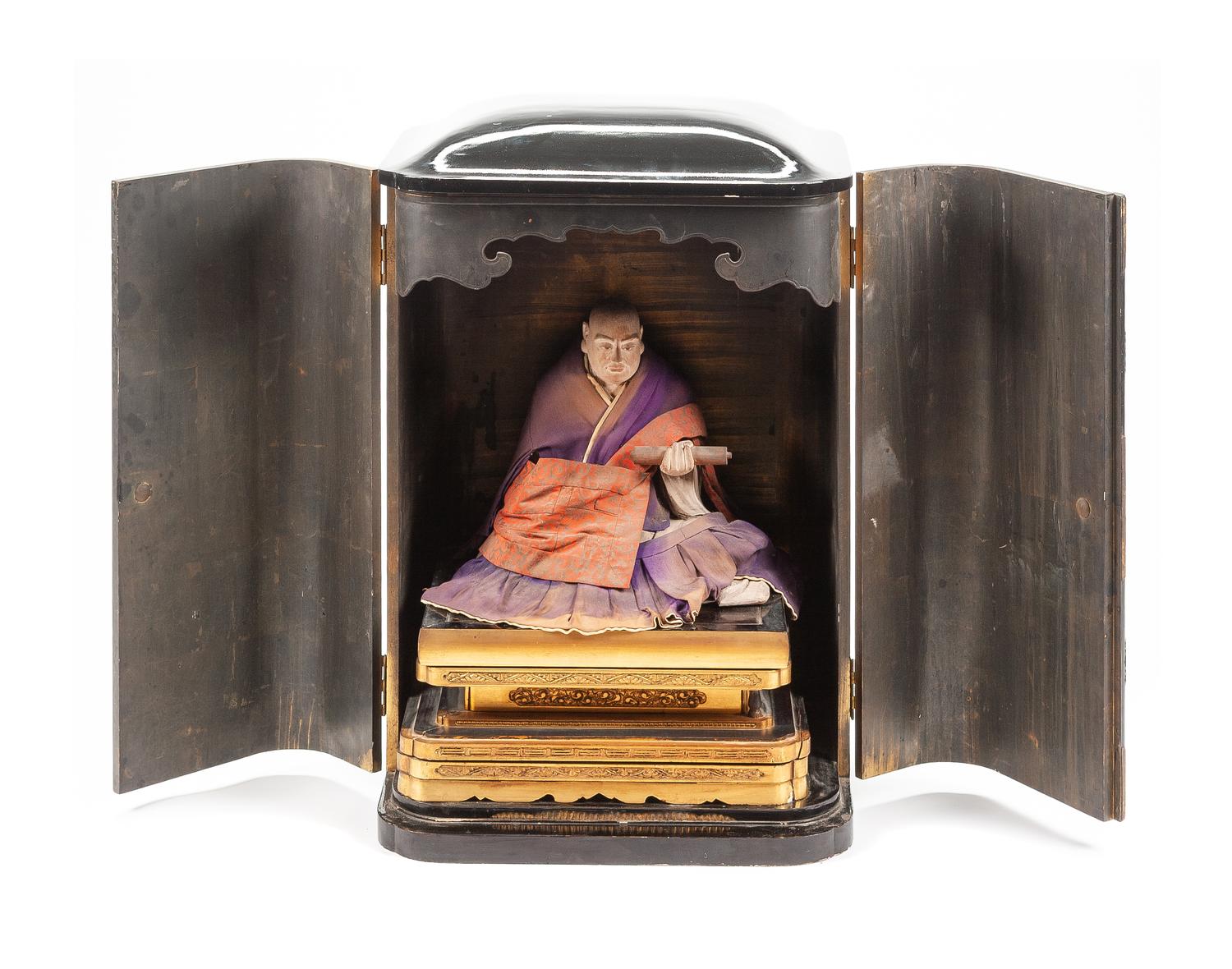 A Japanese Lacquered Shrine Height 30 x width 20 1/2 x depth 15 inches.