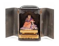 A Japanese Lacquered Shrine Height 30 x width 20 1/2 x depth 15 inches.