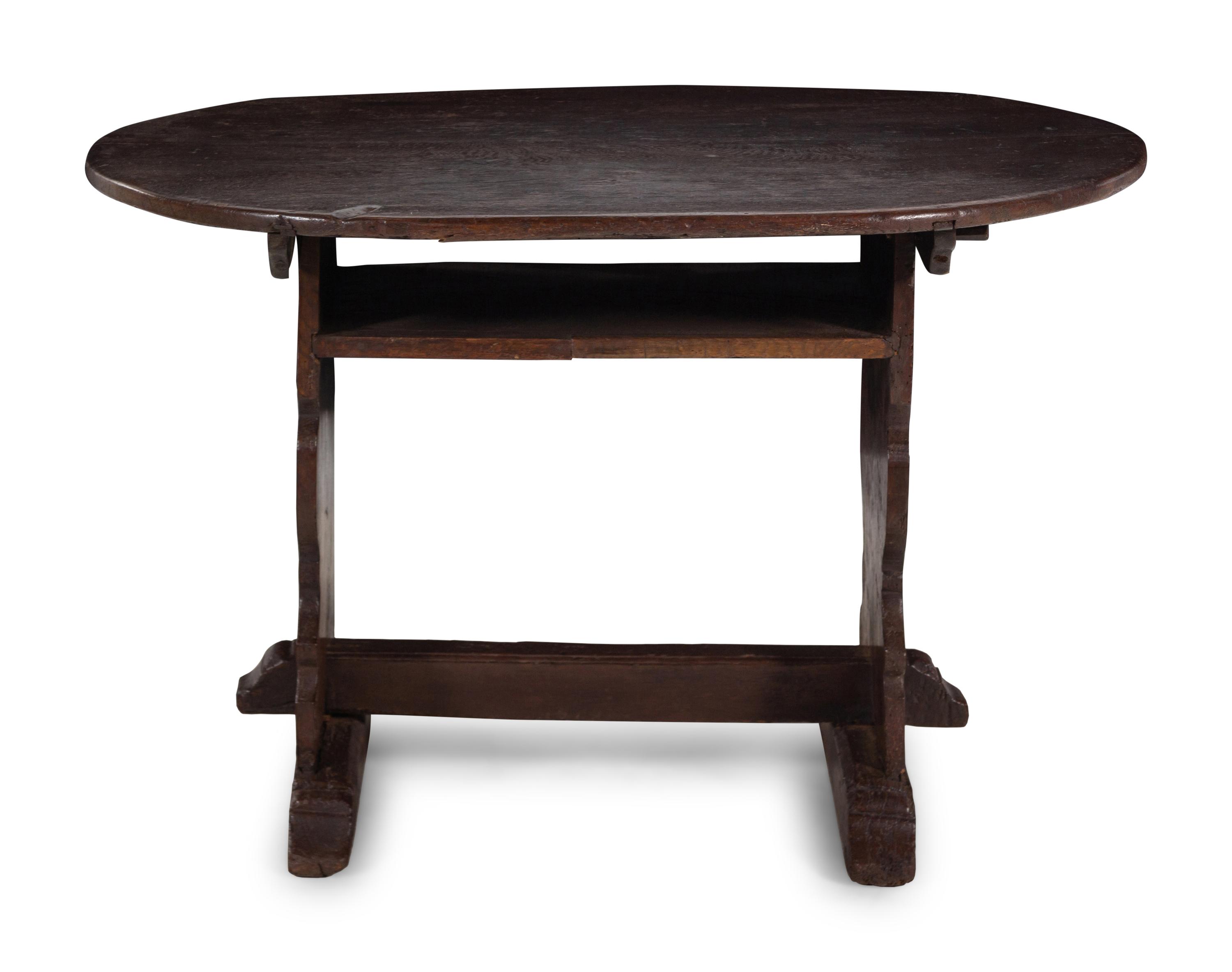 A Continental Oak Oval Trestle Table