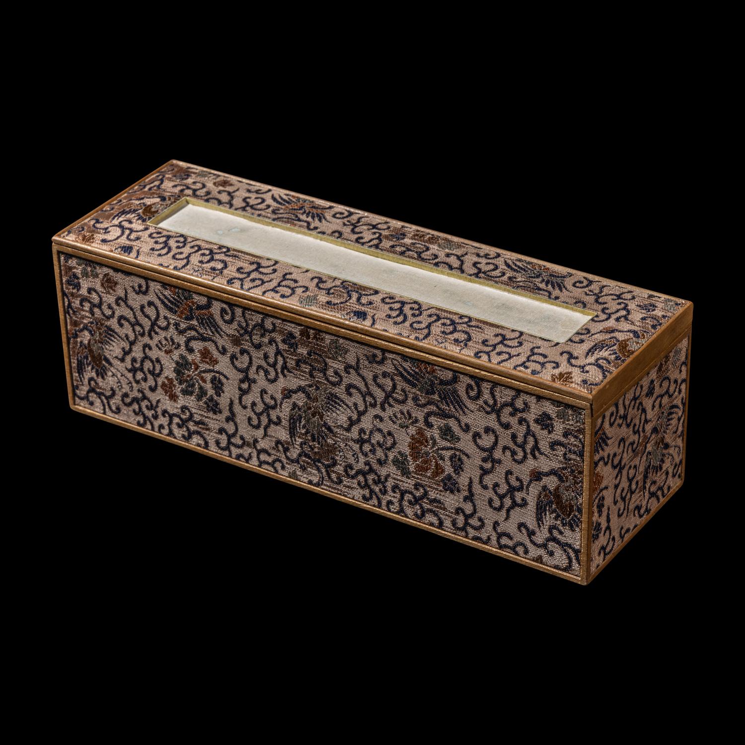 A Chinese Parcel-Gilt Silver Repoussé 'Plantain Leaves' Rectangular Scroll Box, Incised Qianlong Mark 清乾隆乙卯（1796）銀鎏金鏨蕉葉紋手卷機關盒