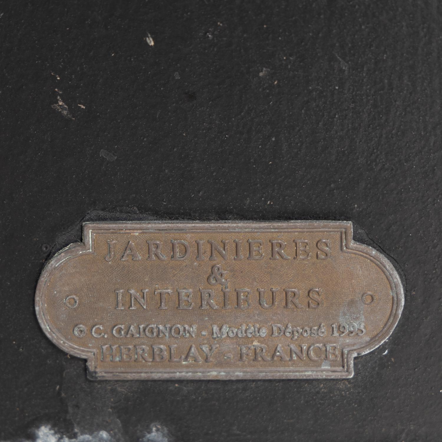 A Pair of Gaignon Black Enameled Metal Jardinières