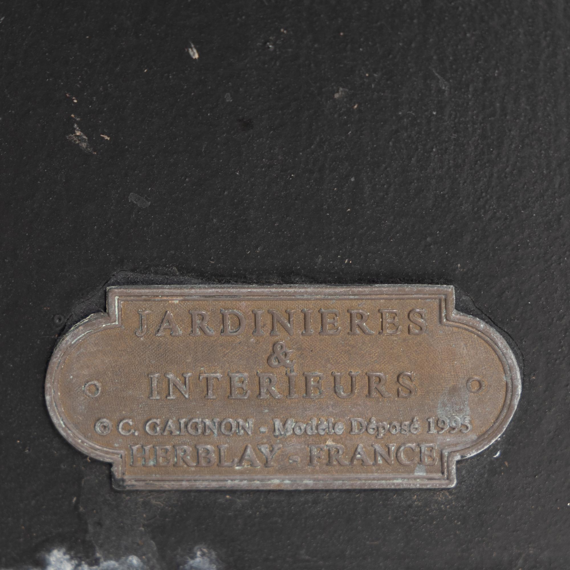 A Pair of Gaignon Black Enameled Metal Jardinières