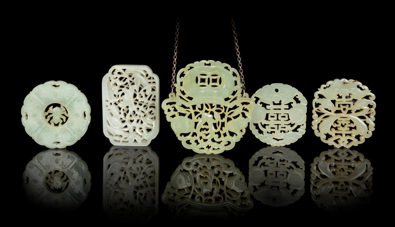 Five Chinese Celadon Jade Pendants Length of largest 3 inches. — QING DYNASTY