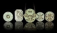 Five Chinese Celadon Jade Pendants Length of largest 3 inches. — QING DYNASTY