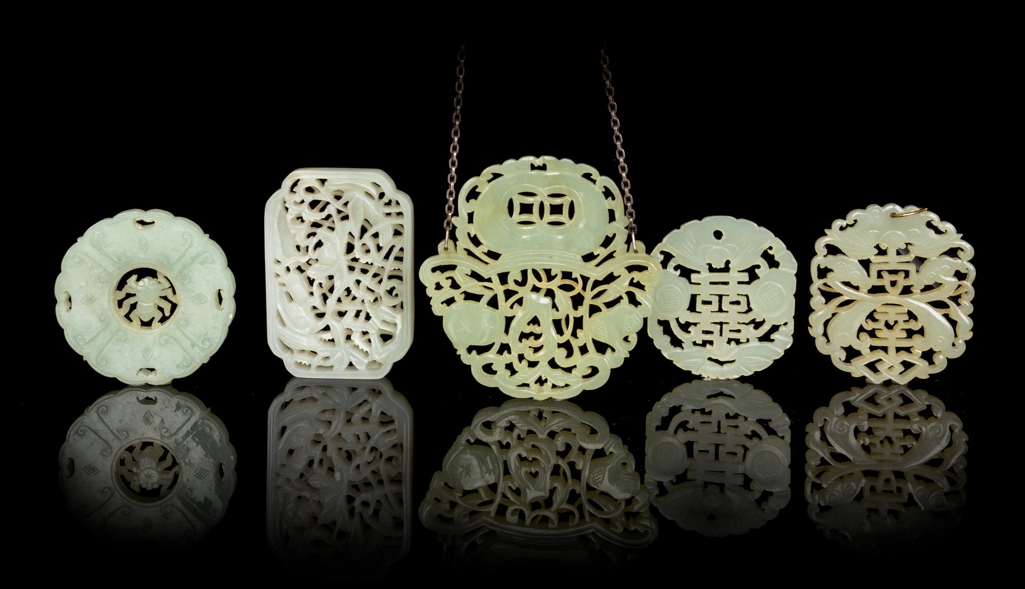 Five Chinese Celadon Jade Pendants Length of largest 3 inches. — QING DYNASTY