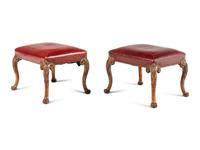 A Pair of George II Style Carved Walnut Stools