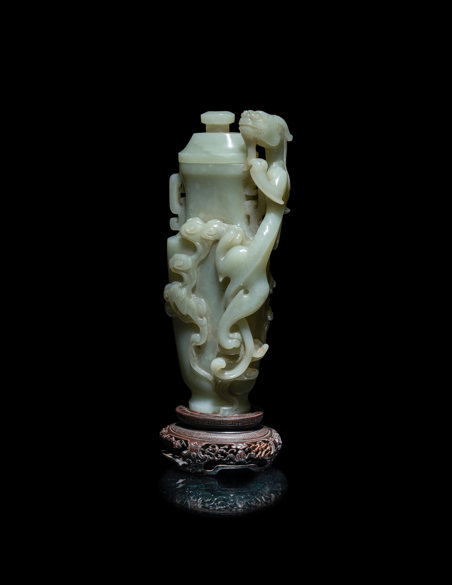 A Finely Carved Chinese Celadon Jade 'Chilong' Covered Vase