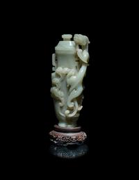 A Finely Carved Chinese Celadon Jade 'Chilong' Covered Vase