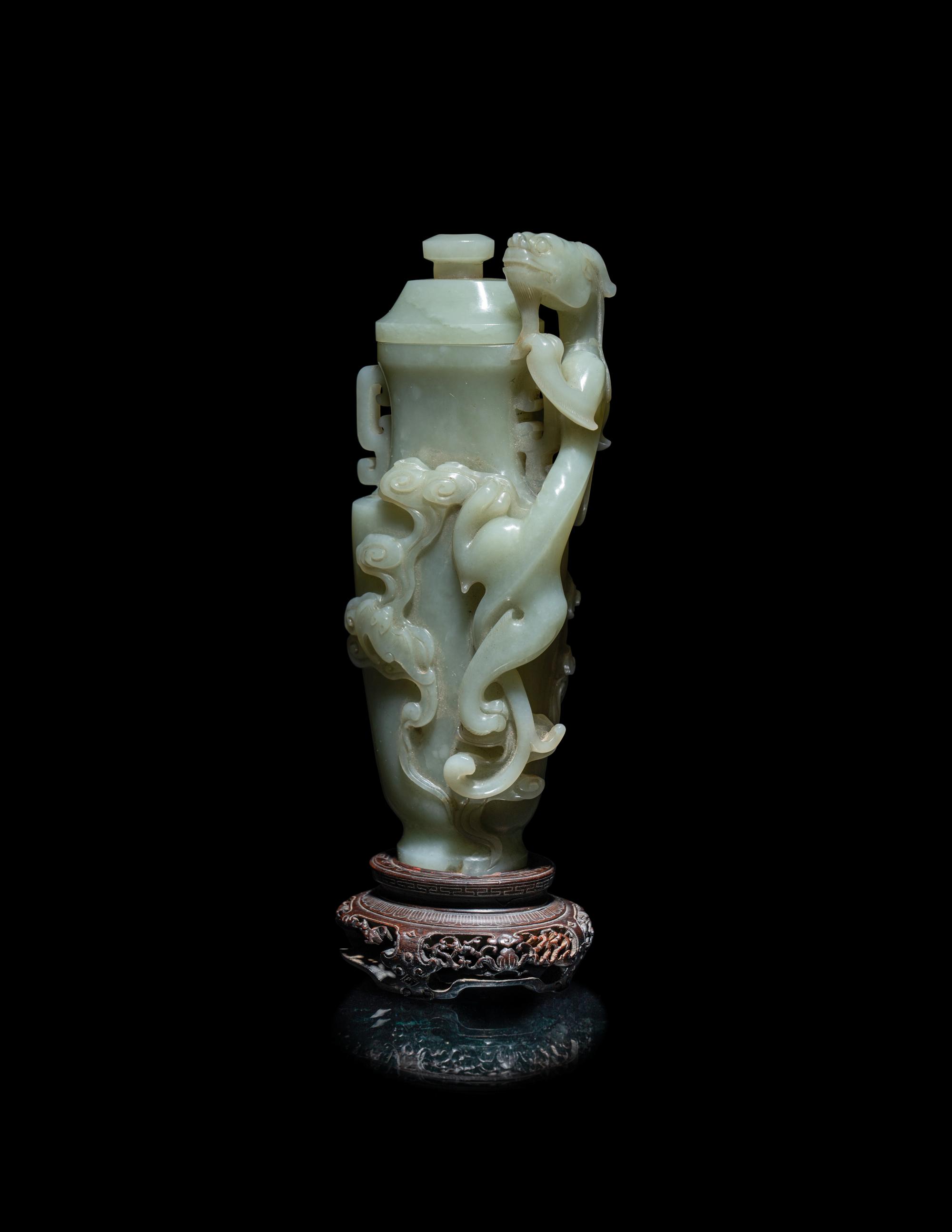 A Finely Carved Chinese Celadon Jade 'Chilong' Covered Vase