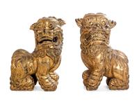 A Pair of Gilt Decorated Lion Figures