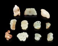 Eleven Chinese Celadon and Russet Jade Articles