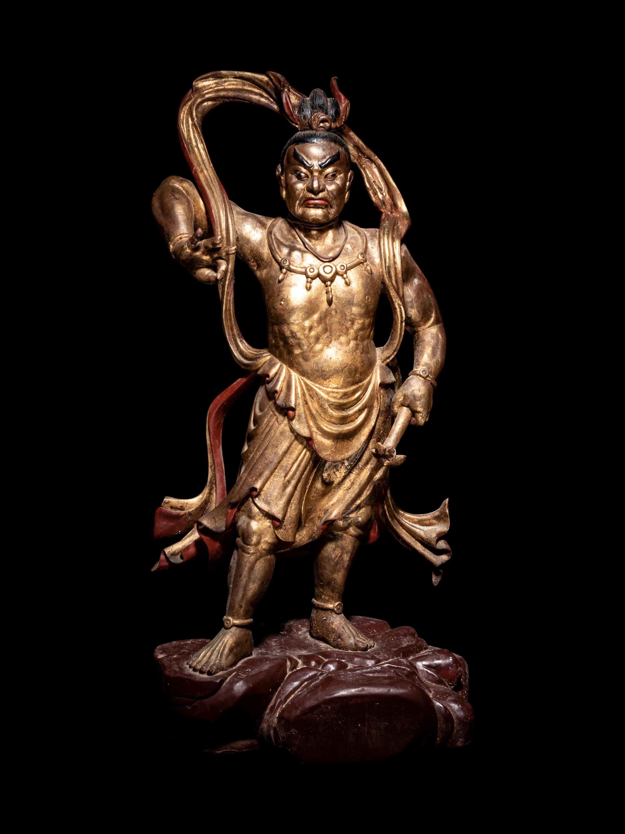 A Pair of Gilt and Red Lacquered Wood Figures of Guardians