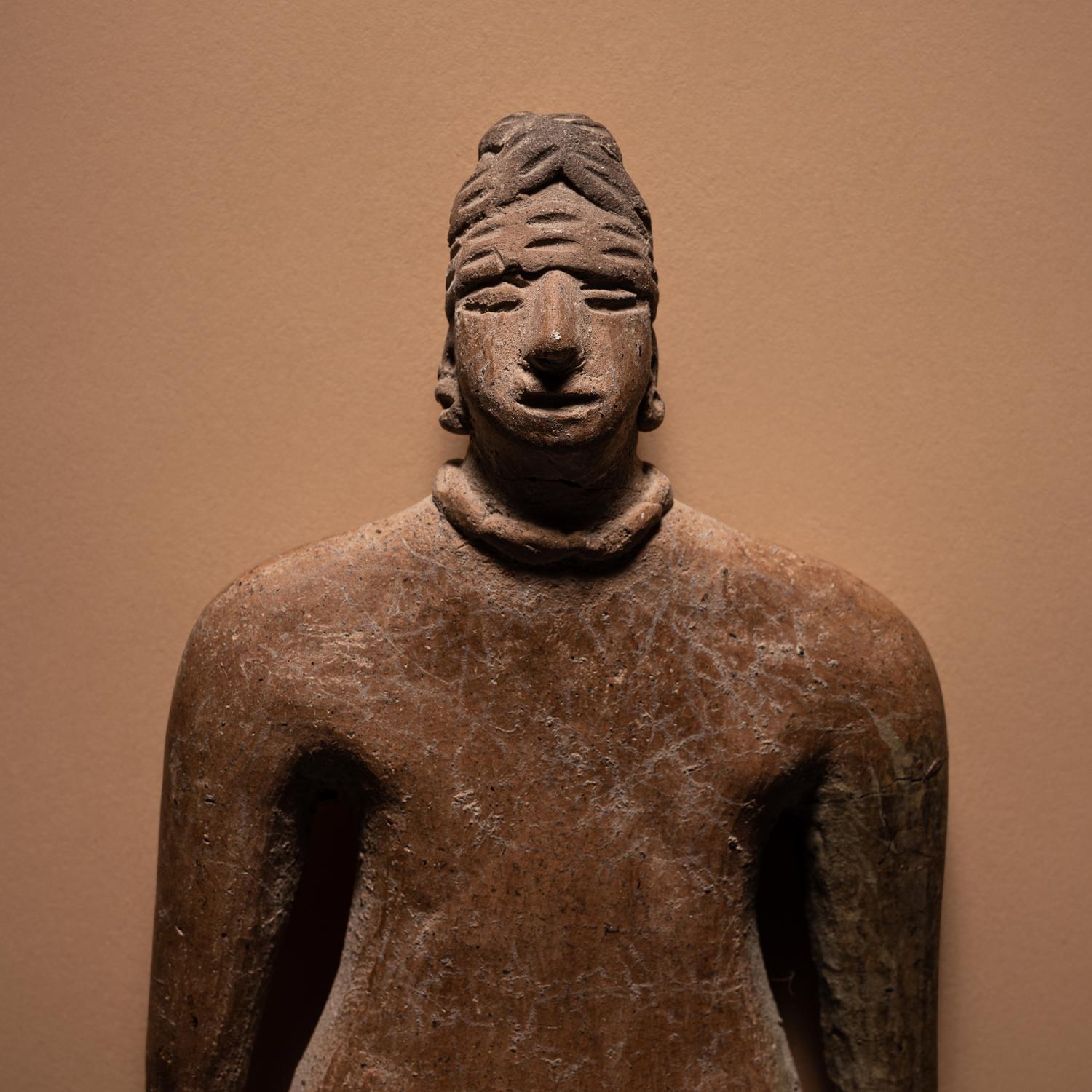 A Colima Standing Female Figure