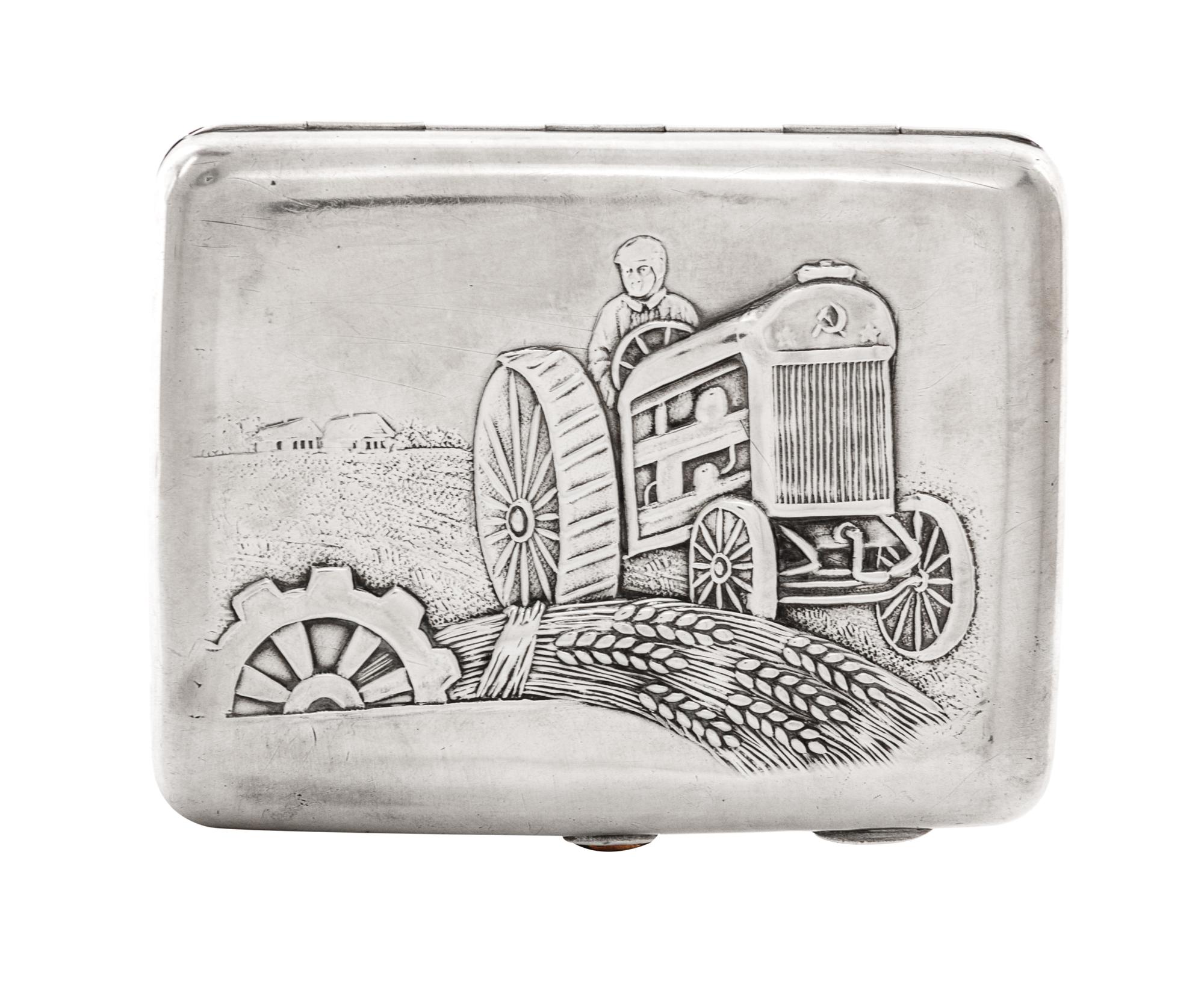 A Russian Silver Cigarette Case, Maker's mark Cyrillic MG, Moscow, early 20th century, the lid with raised decoration showing a man rid