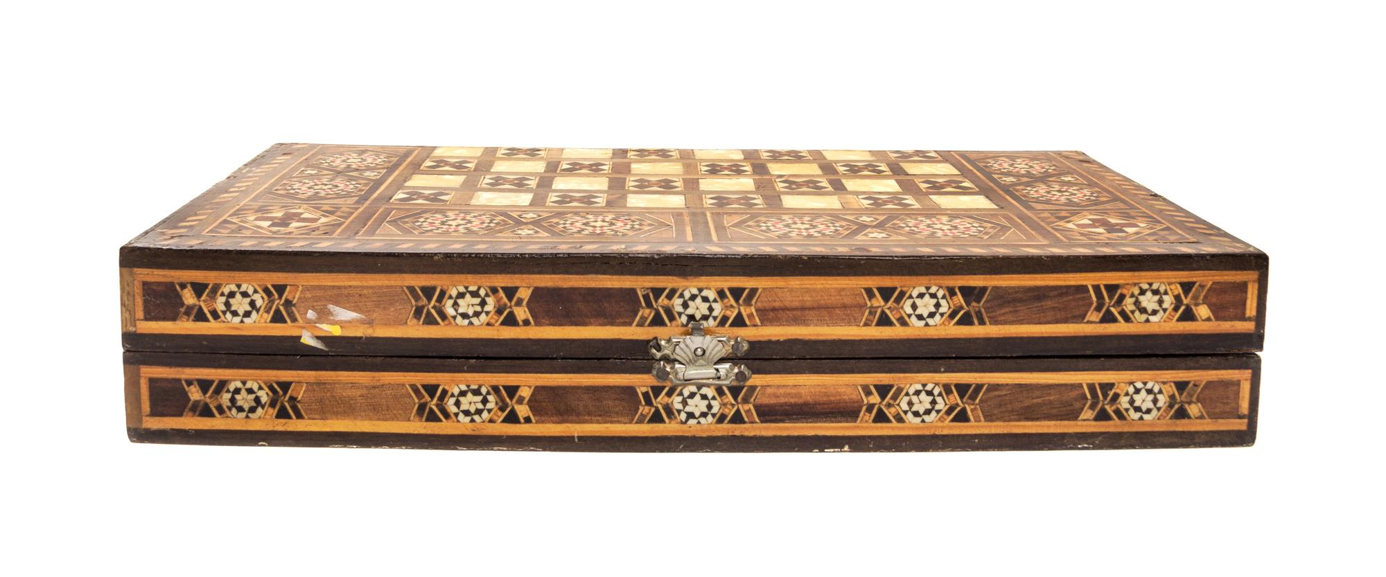 A Syrian Marquetry Inlaid Game Board Height 2 3/4 x width 15 1/4 x depth 7 1/2 inches (closed.)