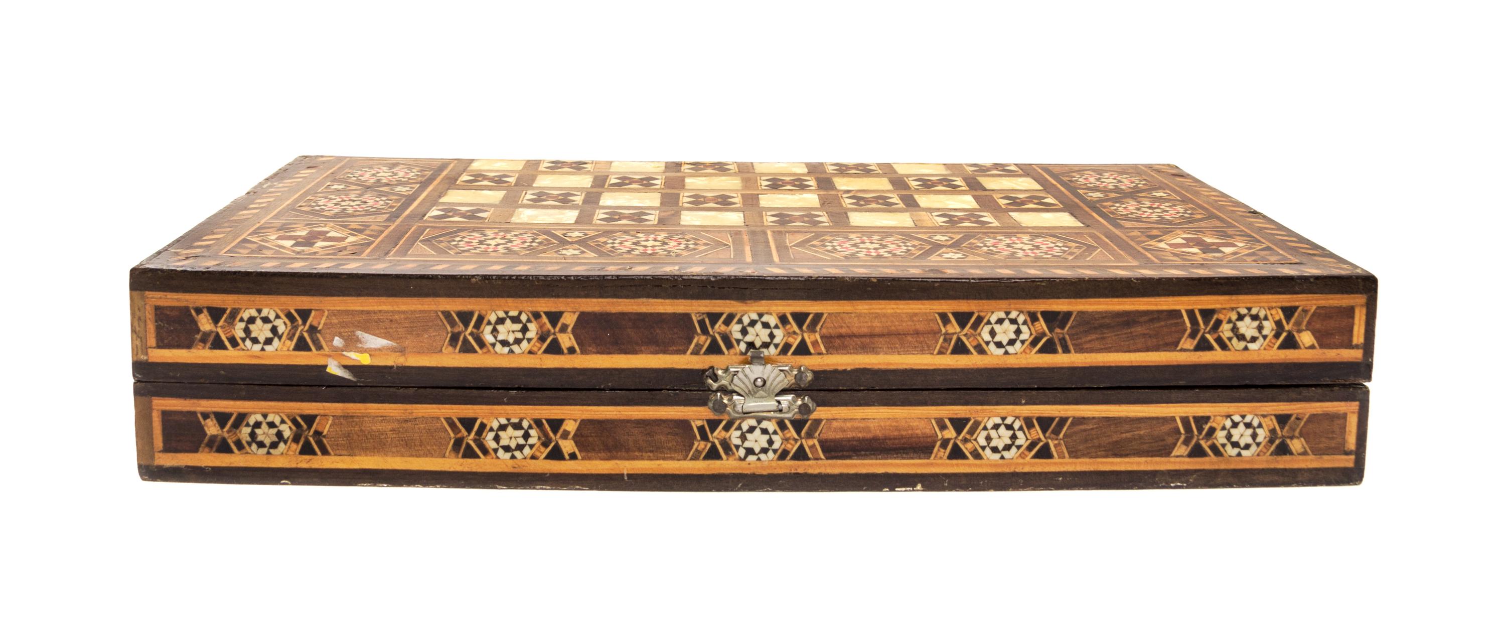 A Syrian Marquetry Inlaid Game Board Height 2 3/4 x width 15 1/4 x depth 7 1/2 inches (closed.)
